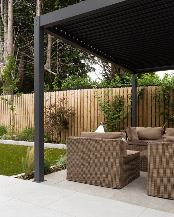 Outdoor patio area with new fence and pavers.