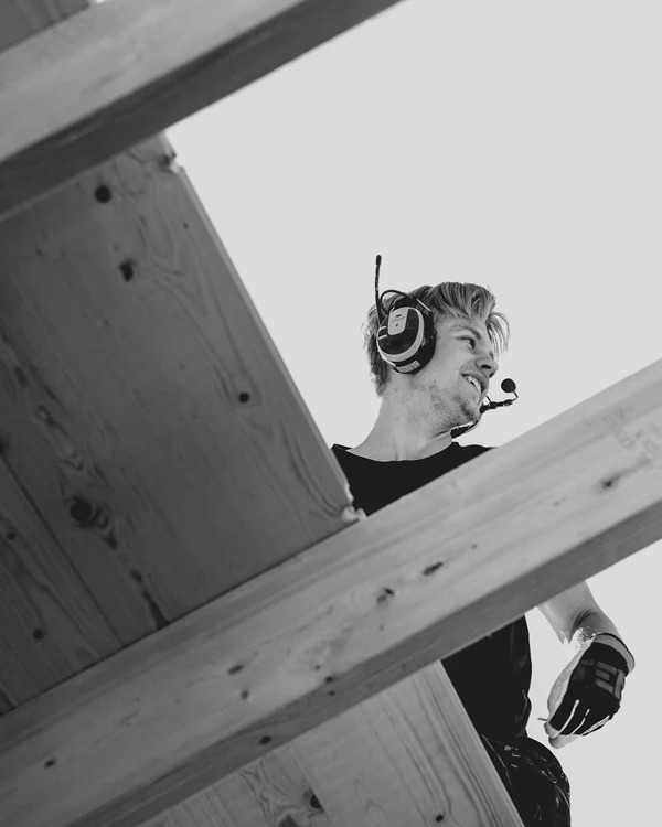 Builder standing on roof after removing part of ceiling to make way for new home alterations in Tauranga